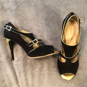 Black and gold heels